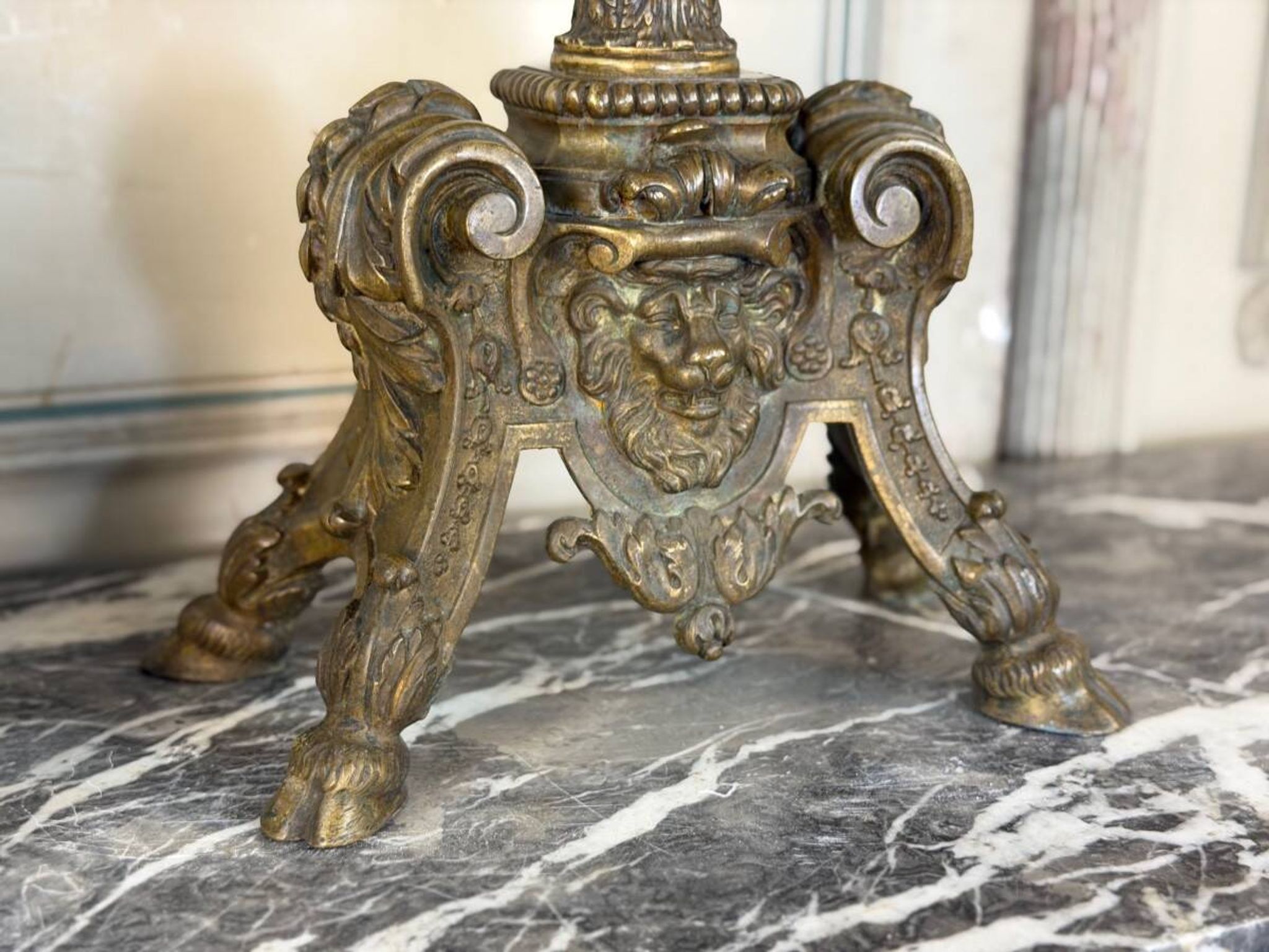 Pair of Louis XIV style andirons in bronze after a design by André-Charles Boulle.