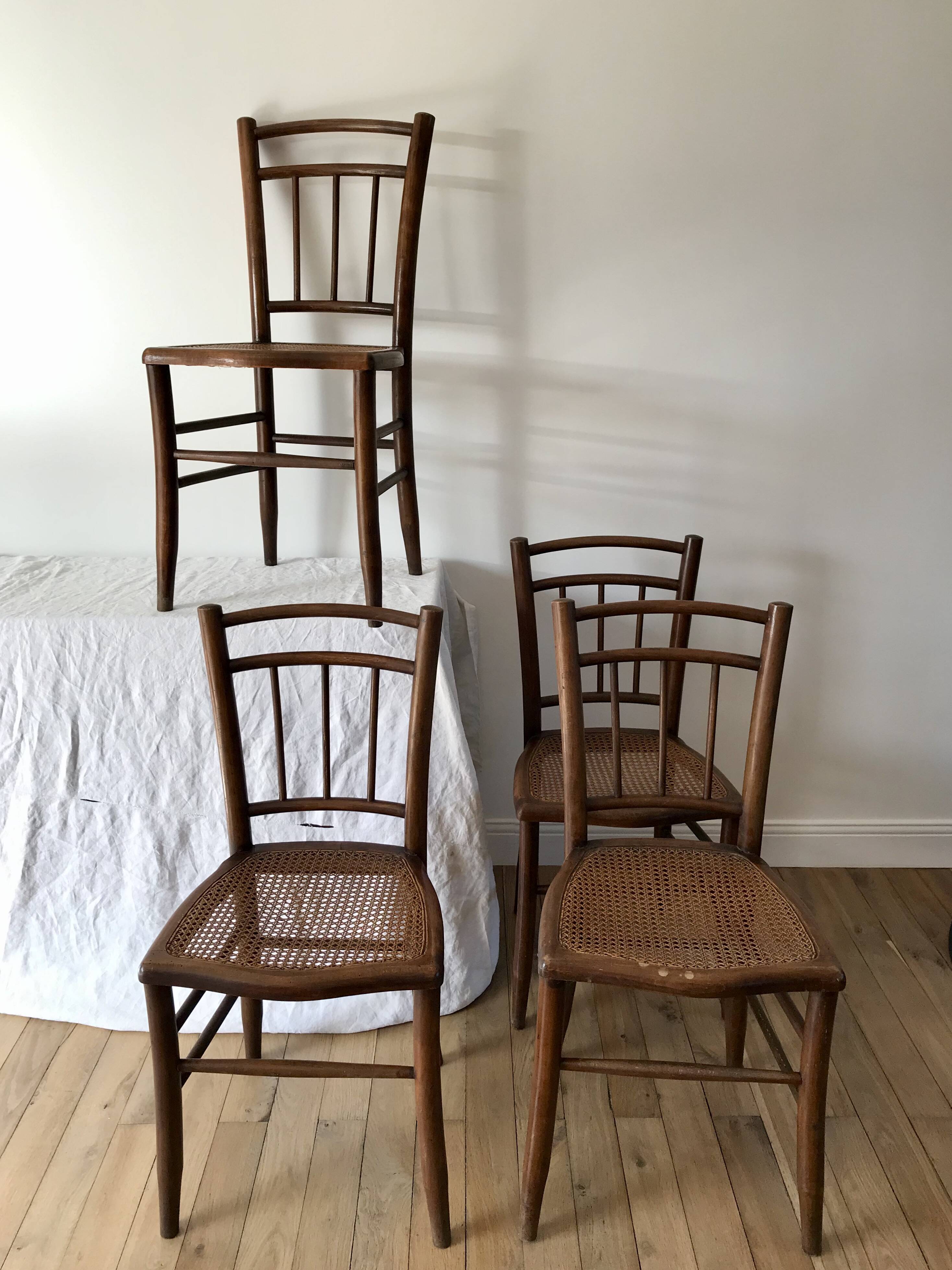 set of 4 bistro chairs in turned wood and canework stamped early 20th century
