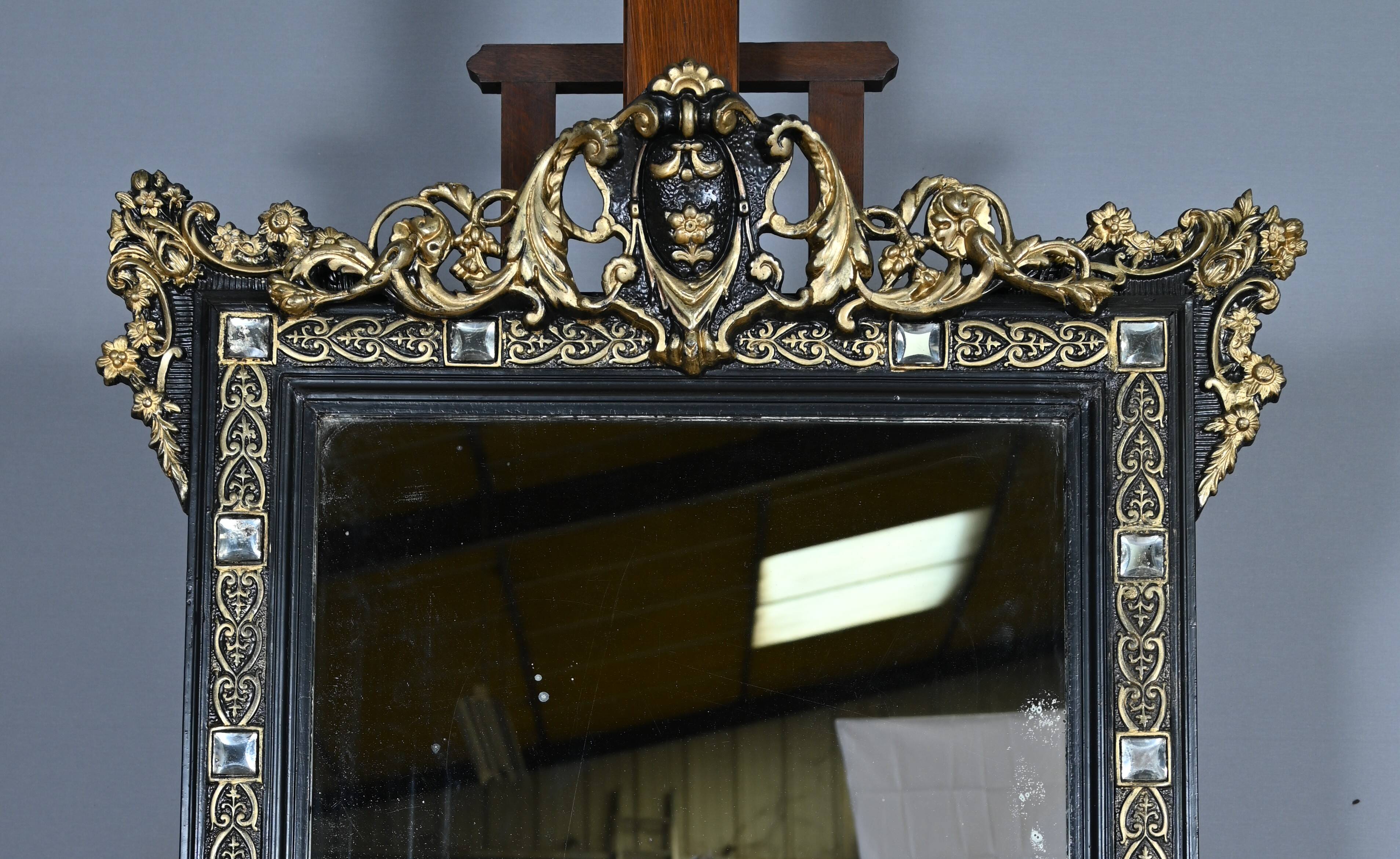 Black and gold Napoleon III mirror, 19th century, 115x86cm
