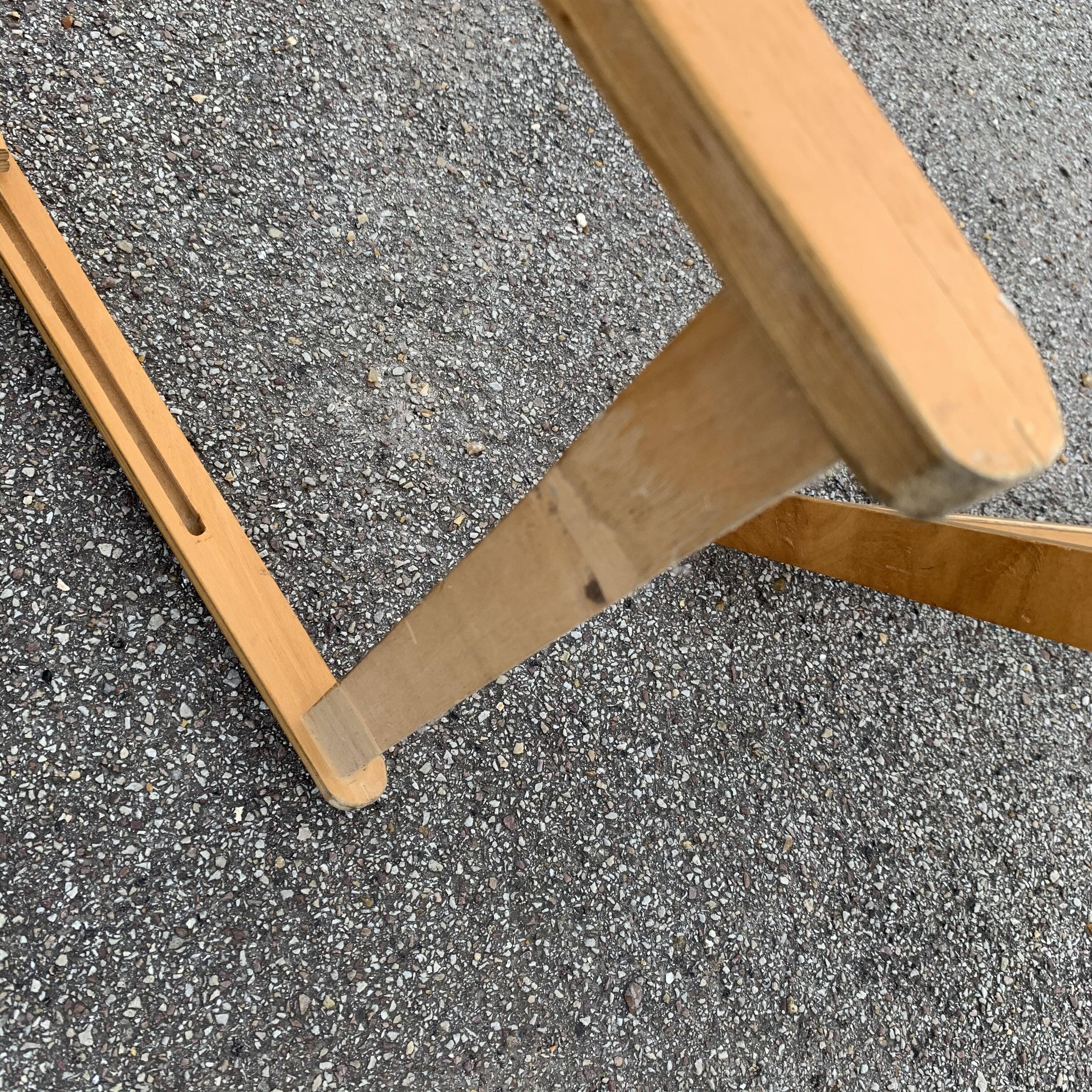 Pair of folding wooden chairs