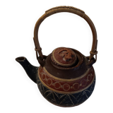 Old terracotta teapot