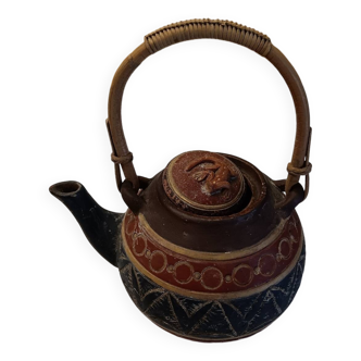 Old terracotta teapot