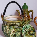 Set of old teapots and honey pot