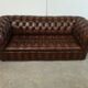 Light brown leather chesterfield sofa upholstered