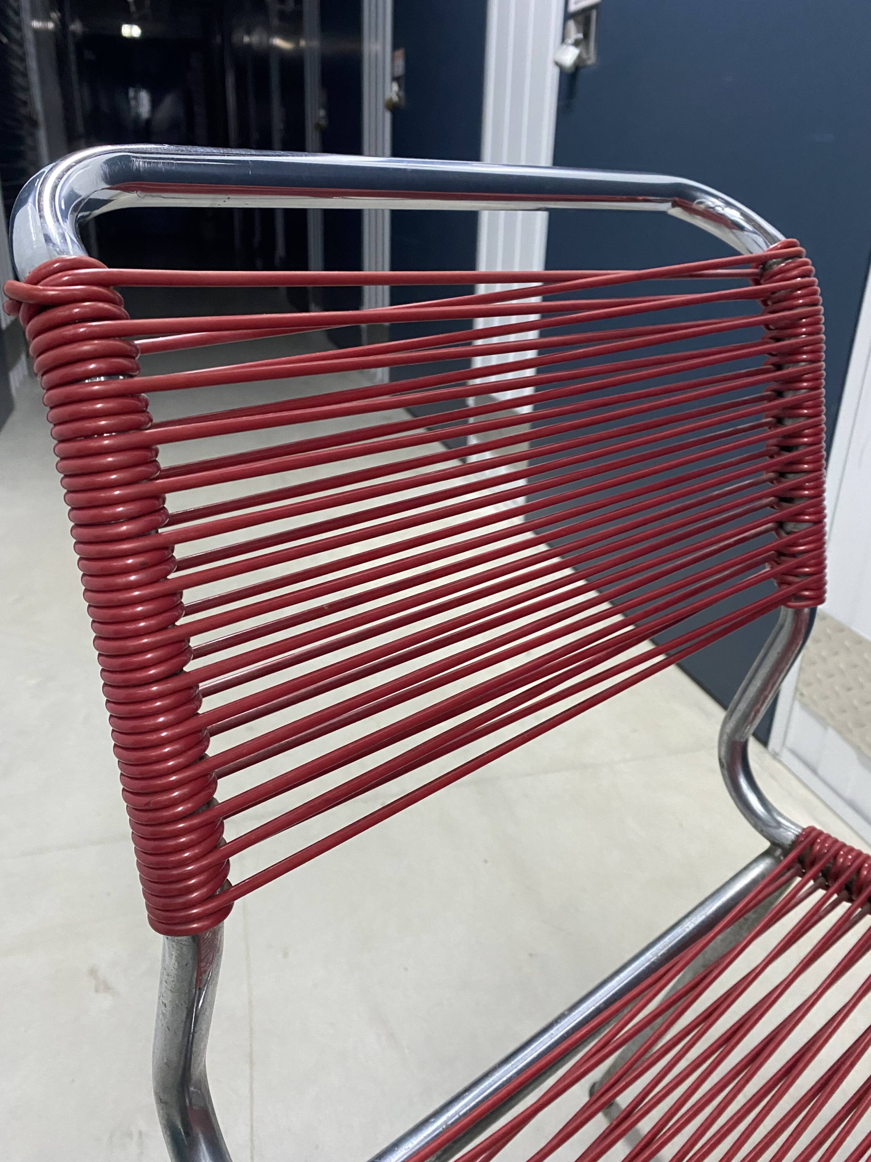 Red scoubidou chair from the 1960s.