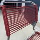 Red scoubidou chair from the 1960s.