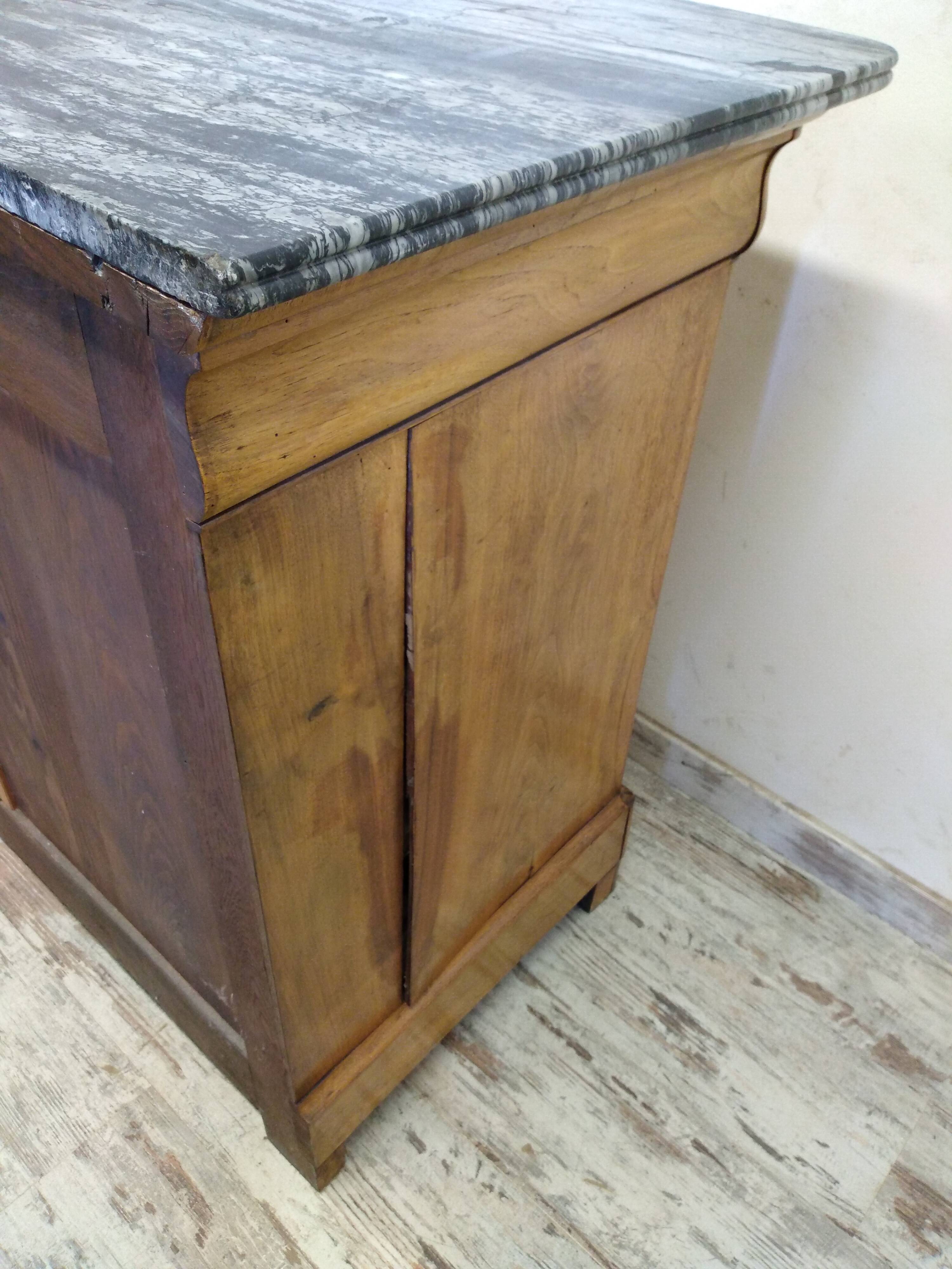 Chest of drawers with marble