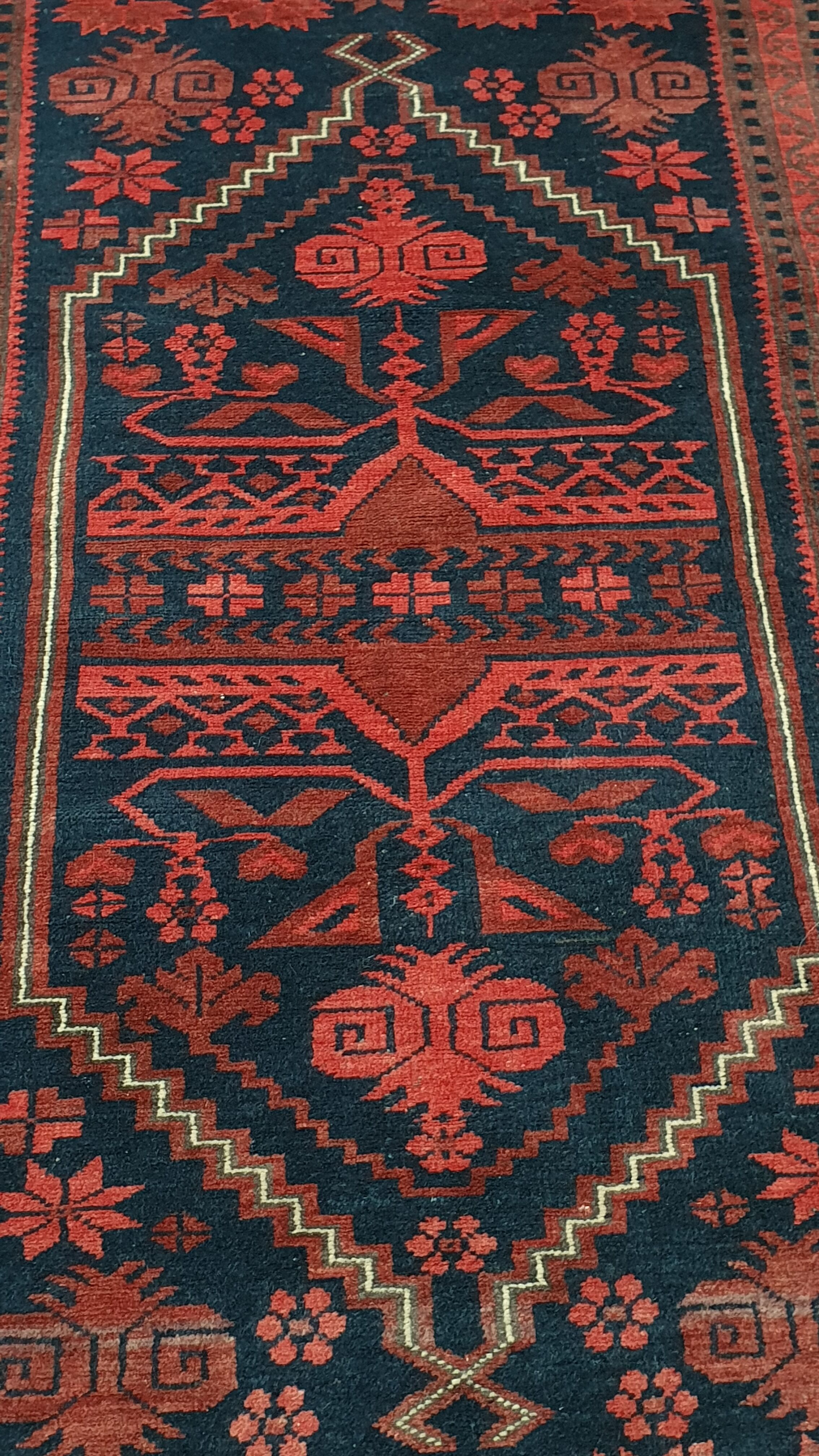Old hand-knotted wool carpet