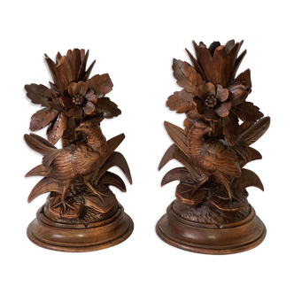 Pair of antique candle holders in carved wood