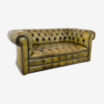 Old vintage leather chesterfield sofa