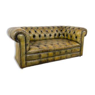Old vintage leather chesterfield sofa