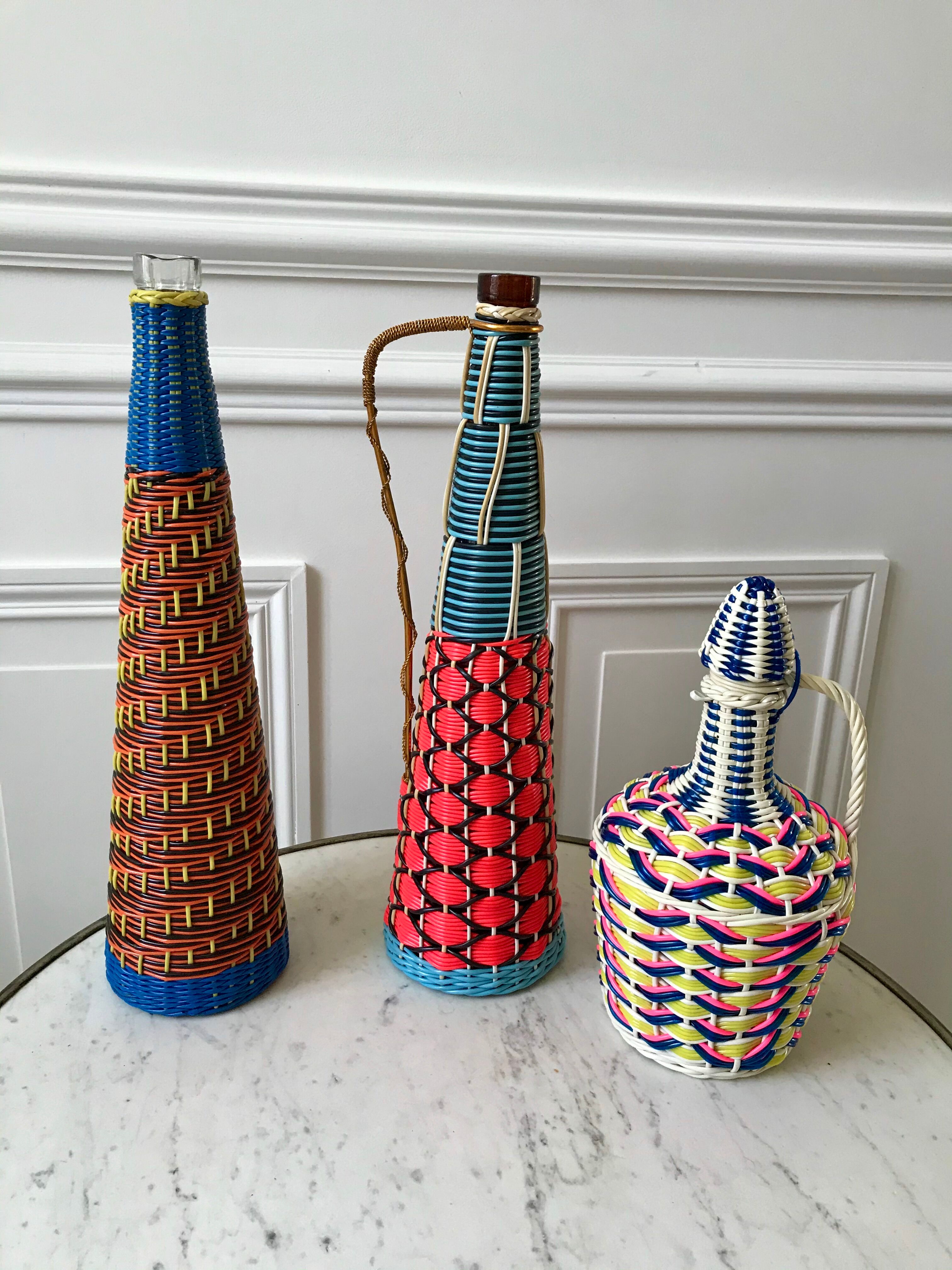 Scoubidou bottle with orange and blue and yellow brass handle 70s