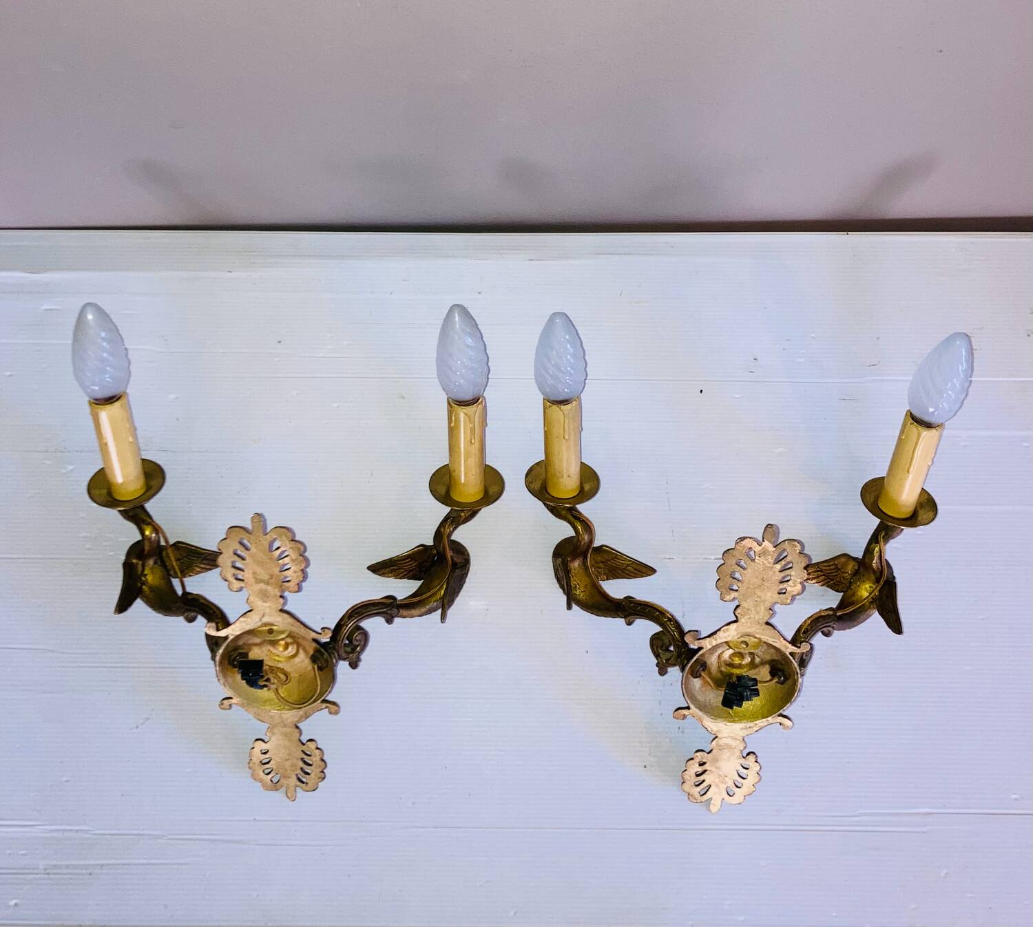 Empire bronze sconces with decorations of swans, palmettes and acanthus leaves
