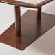 Brutalist conference table made of wood and steel