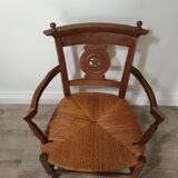 Straw armchair folk art.