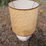 Vintage ceramic table lamp and golden lampshade.