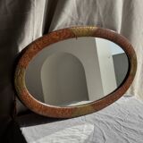 Small oval Art Deco mirror in brown and gold 33x54.