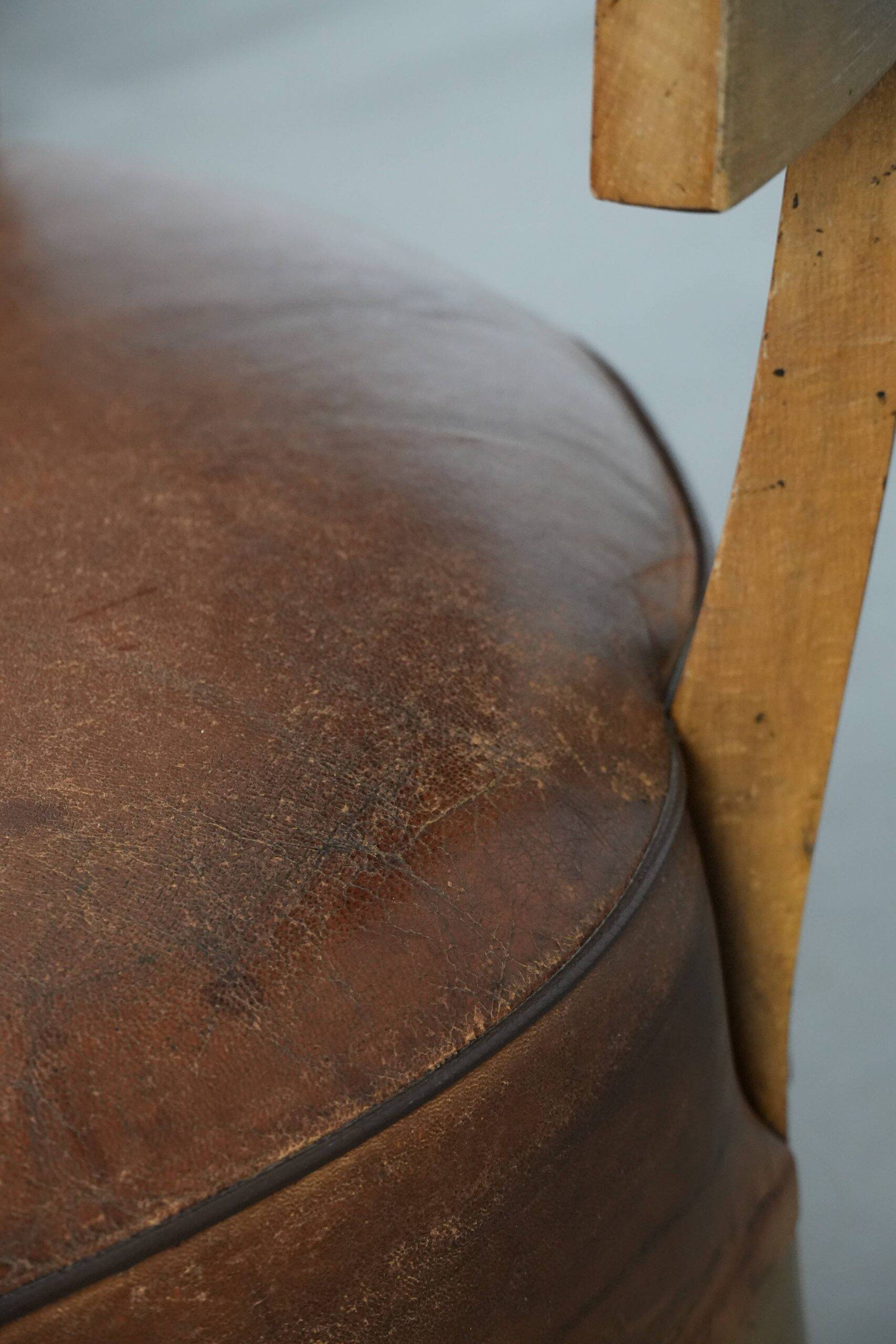 Set of 2 vintage design cocktail chairs/armchairs made of sheepskin leather