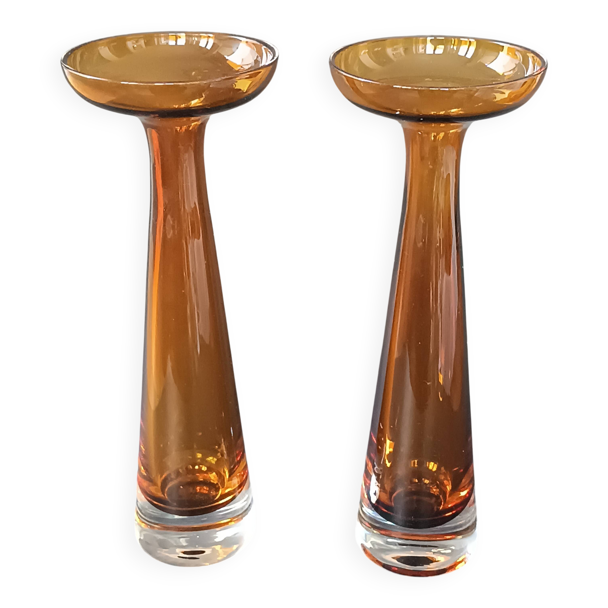 Two vintage Scandinavian double-layered amber blown glass candlesticks