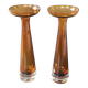 Two vintage Scandinavian double-layered amber blown glass candlesticks