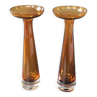 Two vintage Scandinavian double-layered amber blown glass candlesticks