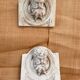 Two moulds; plaster heads