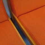 Set of 2 vintage Baumann armchairs in orange fabric and wood from the 80s