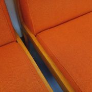Set of 2 vintage Baumann armchairs in orange fabric and wood from the 80s