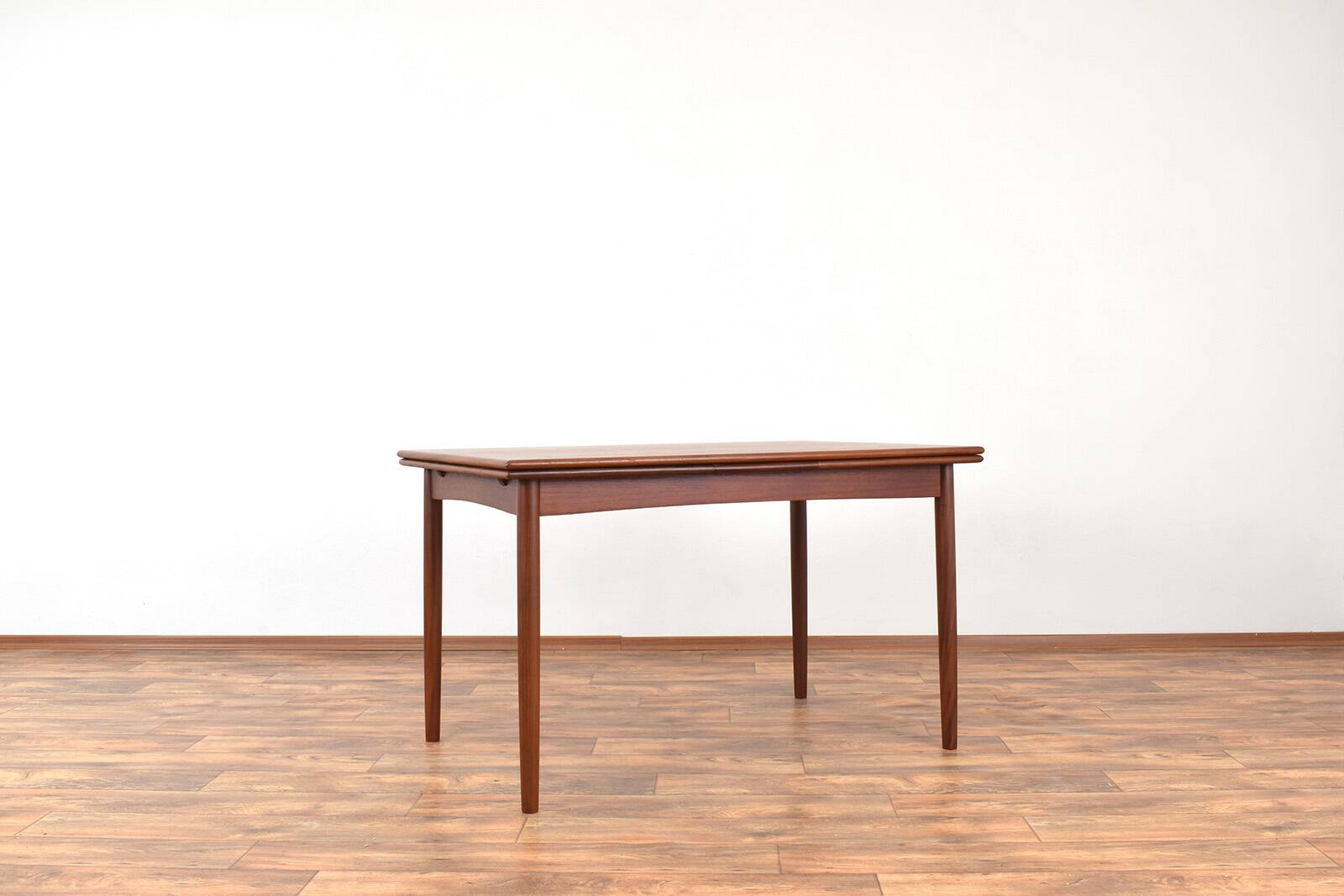 Mid-century Danish teak extendable dining table, 1960s.