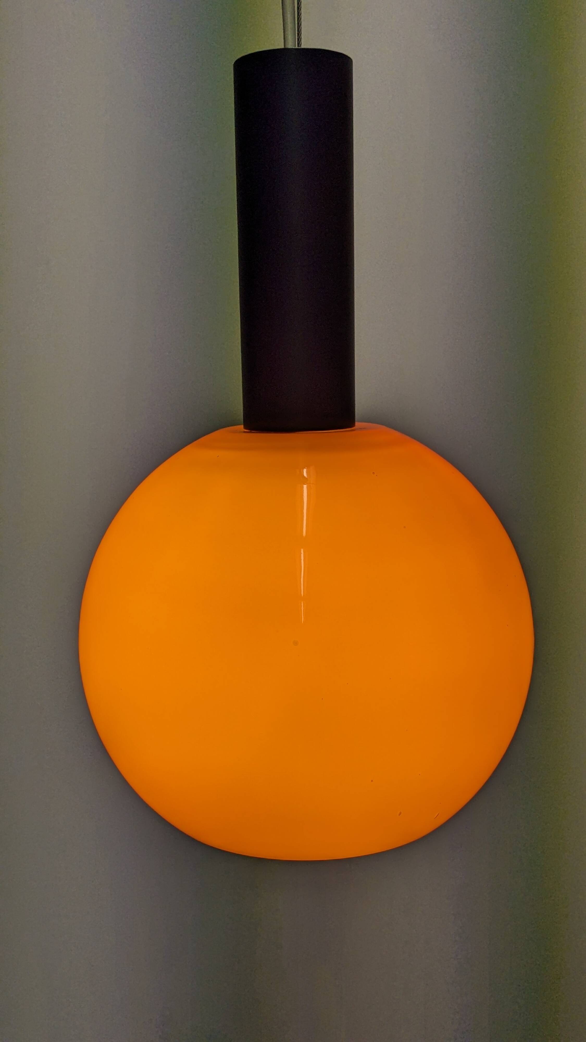 Orange opaline ball pendant by Parscot, France circa 1970.