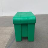 Postmodern plastic stool with a wood effect.