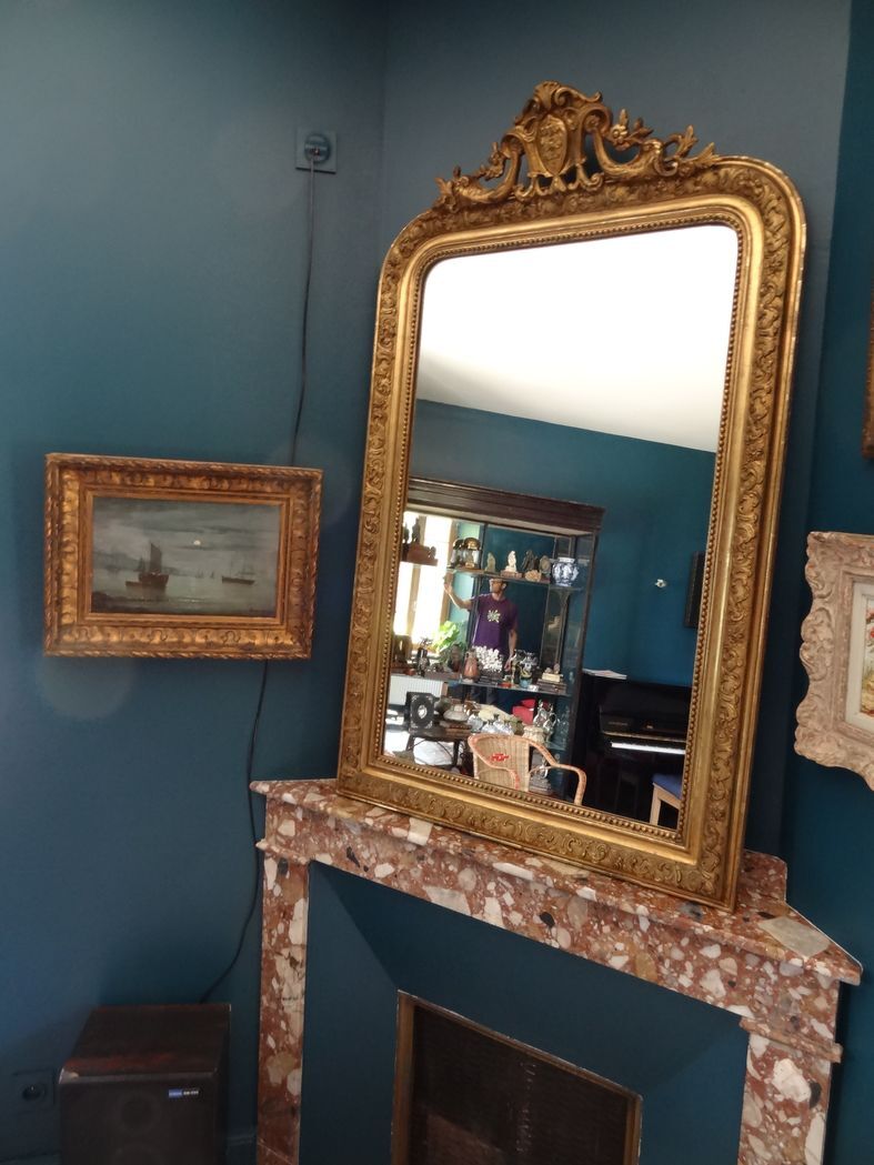 Mirror XIXth in gilded stucco, H 142 cm