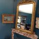 Mirror XIXth in gilded stucco, H 142 cm