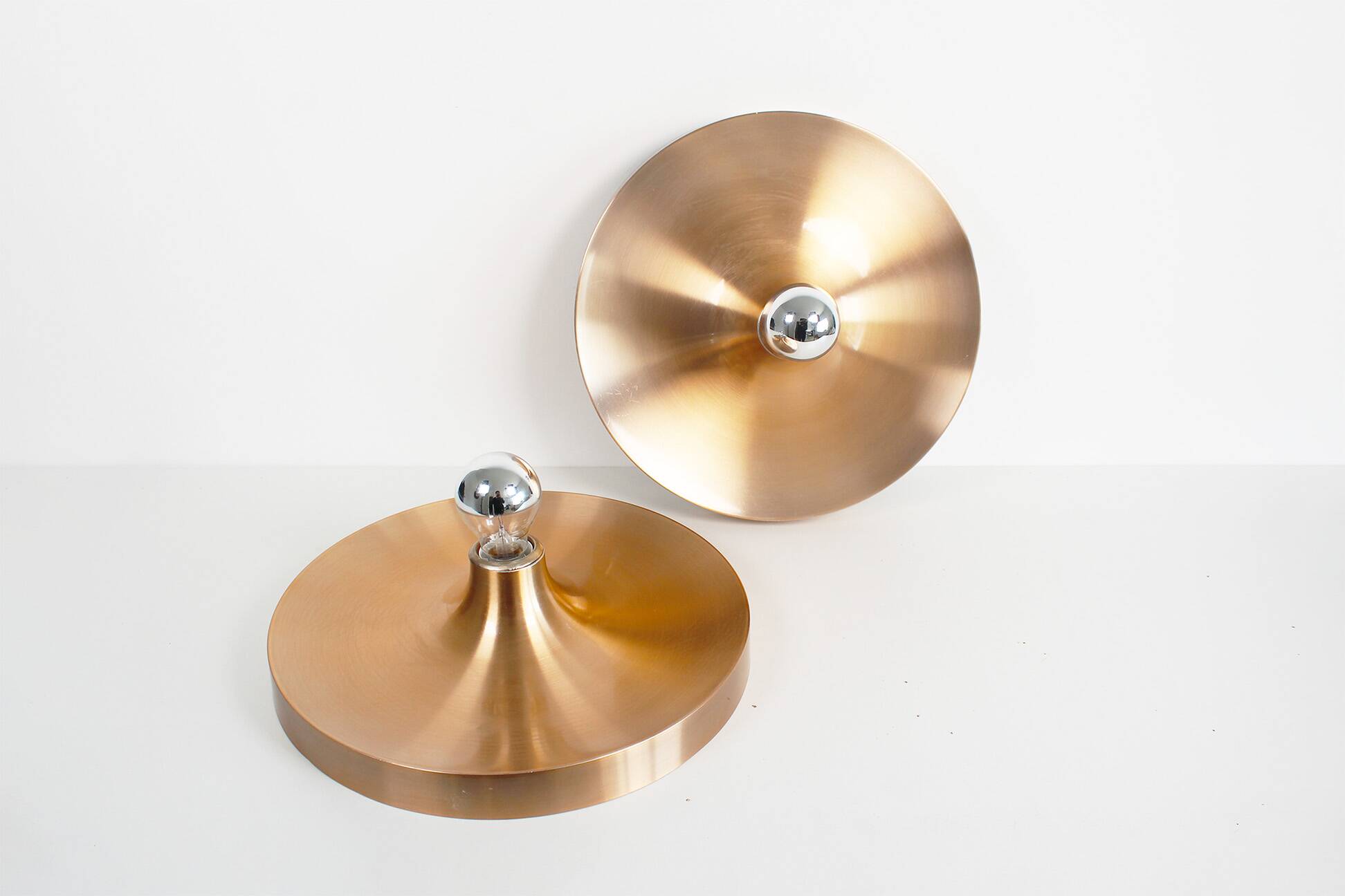 Pair of medium sized (35cm) rose gold Honsel Disc sconces selected by Charl
