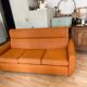 Vintage orange convertible sofa