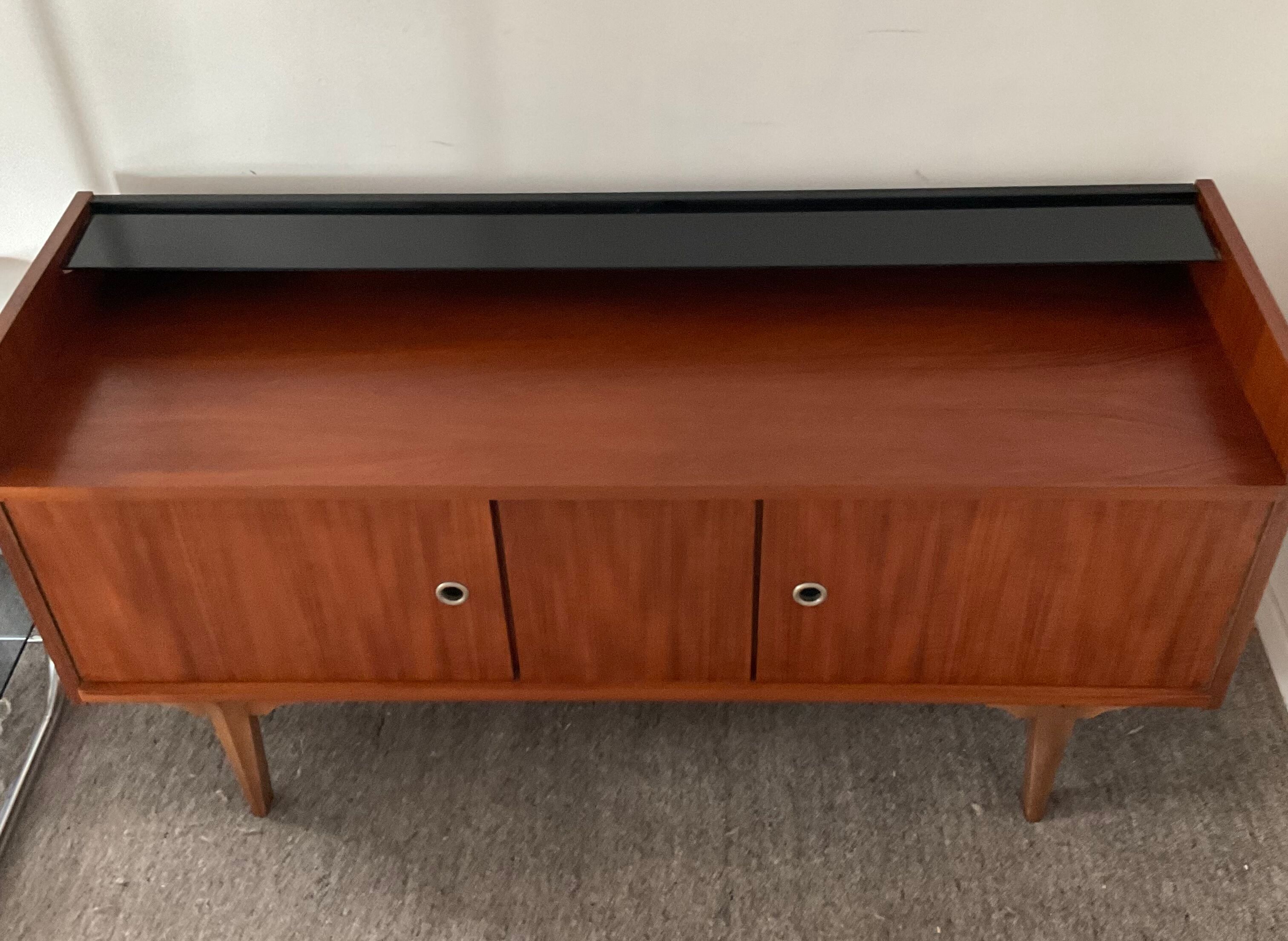 Scandinavian teak row from the 60s