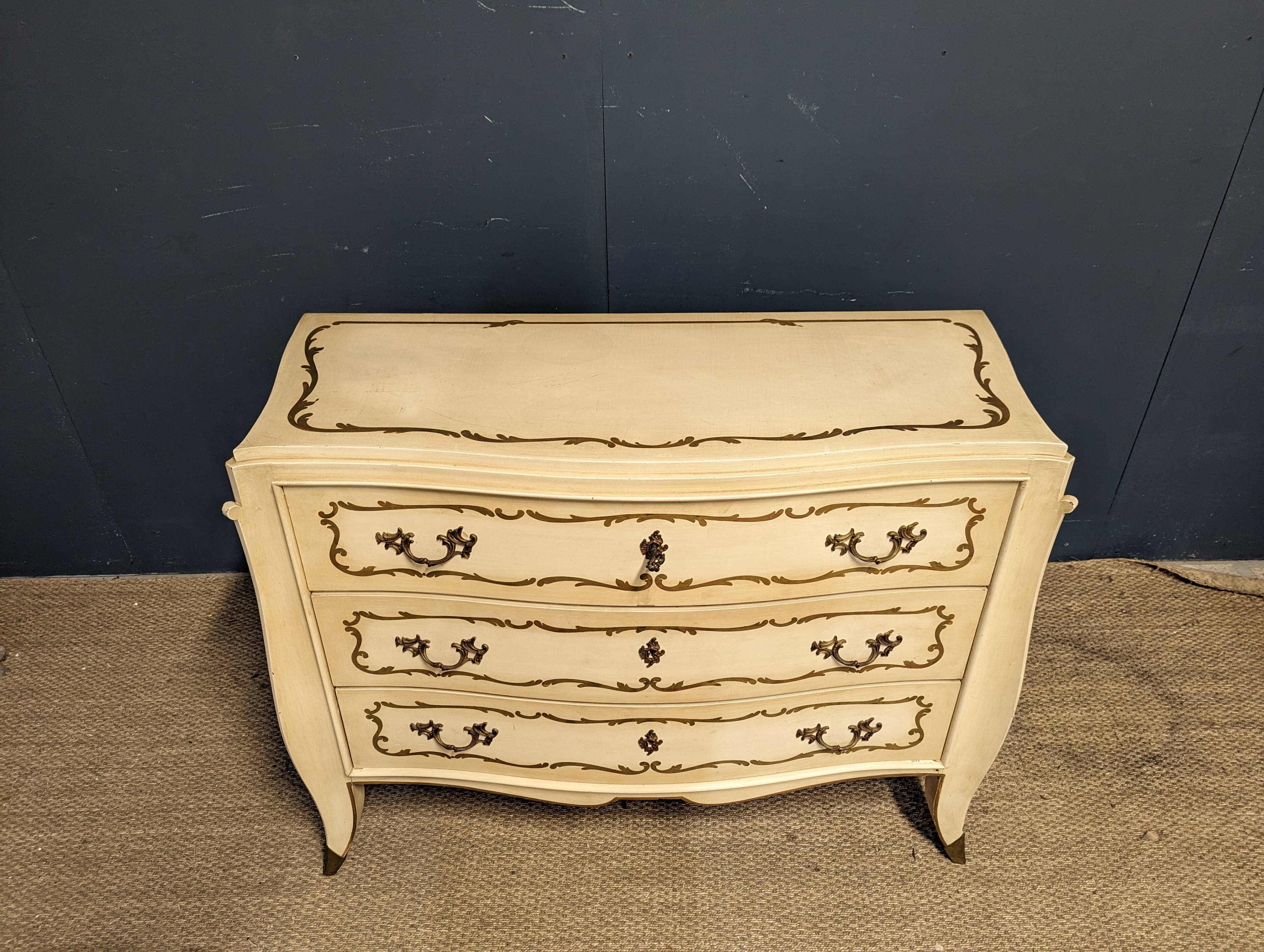 20th century chest of drawers with brass feet