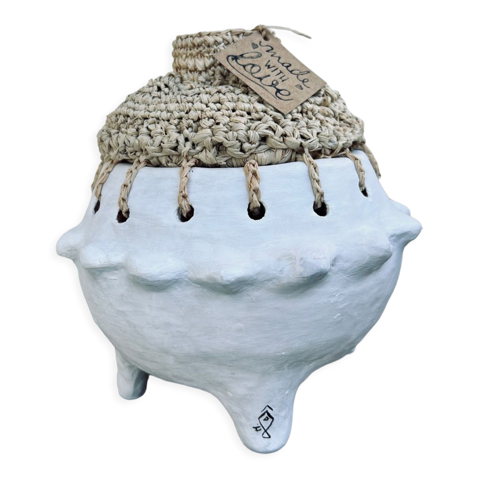Pot en argile et raphia
