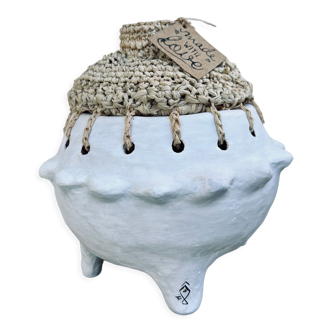 Clay and raffia pot