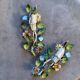 Colorful painted metal floral wall light