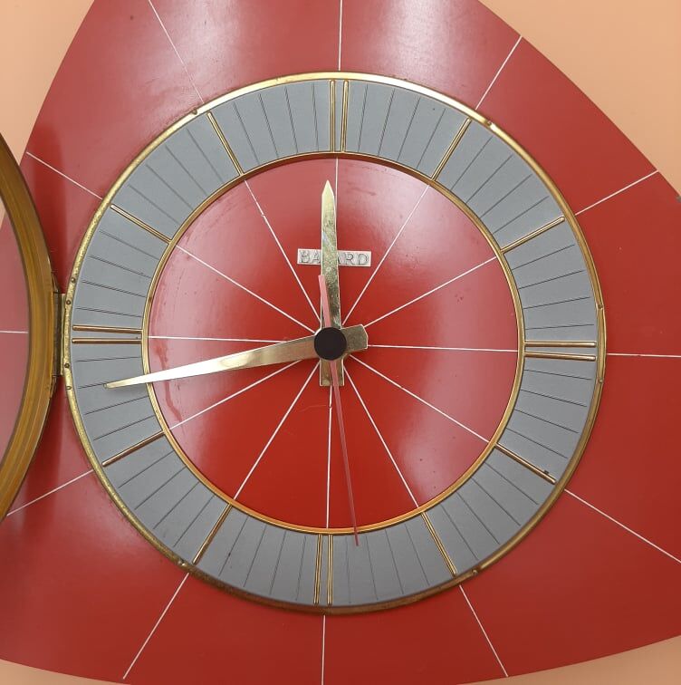 Triangular clock in red formica