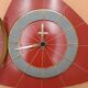 Triangular clock in red formica