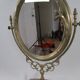 Tilting table mirror and art nouveau photo holder in bronze