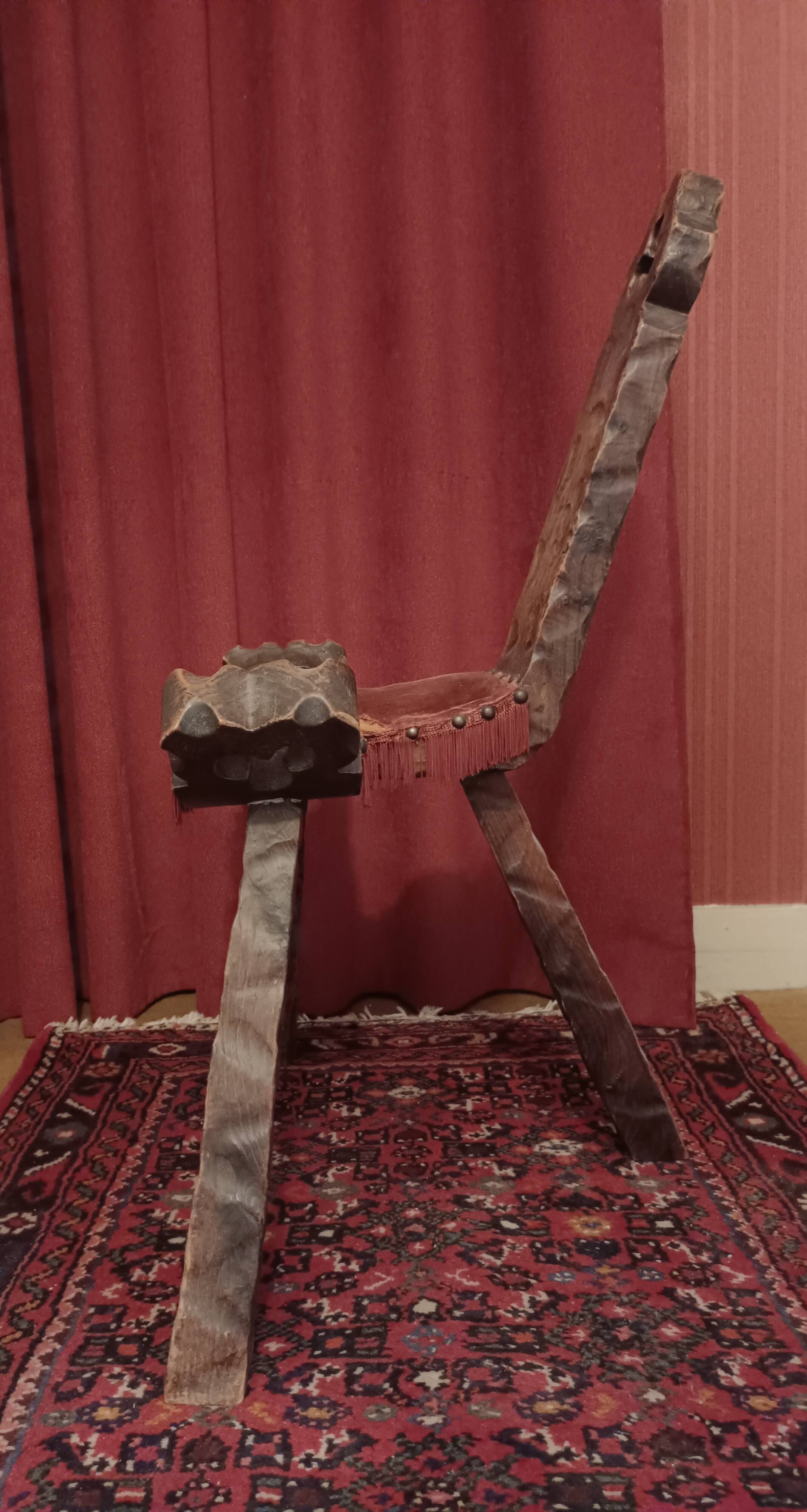 Brutalist chair with tripod legs