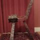 Brutalist chair with tripod legs