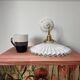 Two wall sconces in serrated white opaline