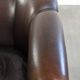 Dark sheepskin club armchair with unique design in English style