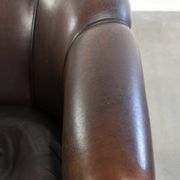 Dark sheepskin club armchair with unique design in English style