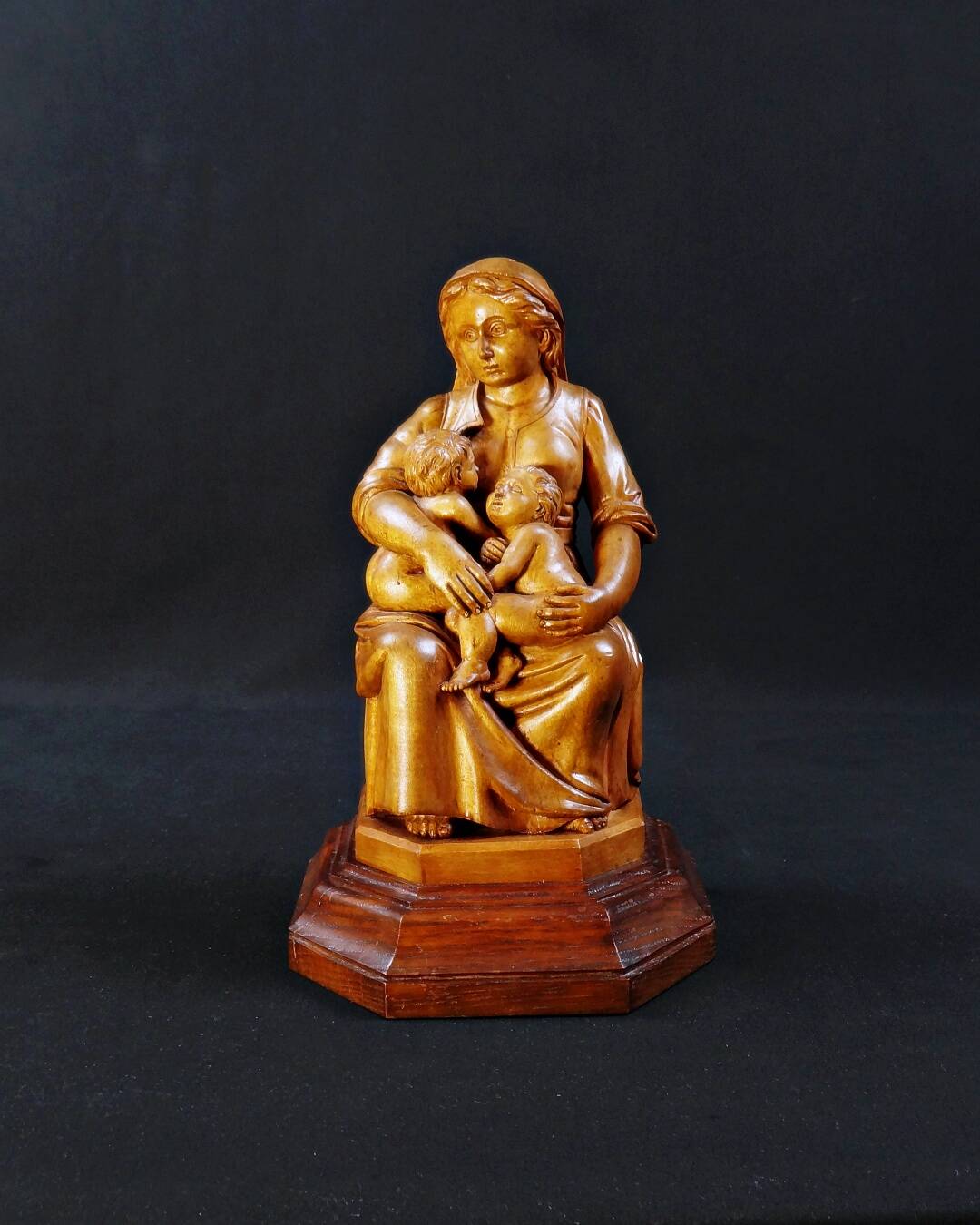 Virgin breastfeeding the Child Jesus and Saint John religious sculpture wood