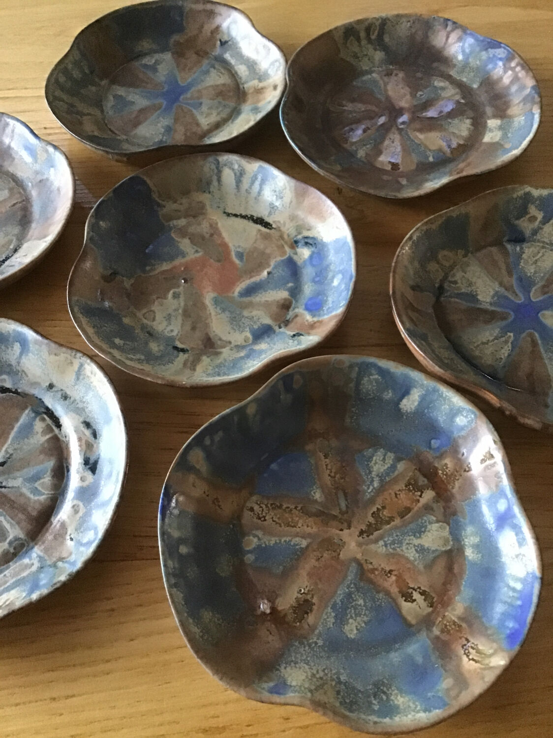 7 stoneware cups signed G Méténier